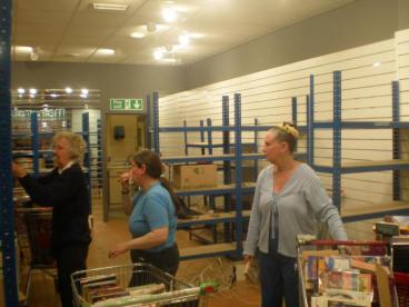 Stacking the shelves in the new bookshop (1)