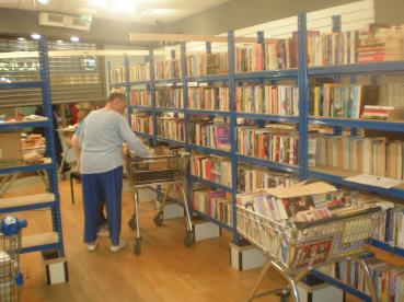 Stacking the shelves in the new bookshop (2)