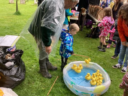 Young boy hooking a duck