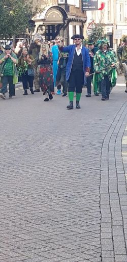 the town crier leading the parade the town crier leading the parade