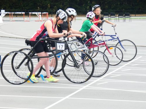 a group of girls aty the start of their race