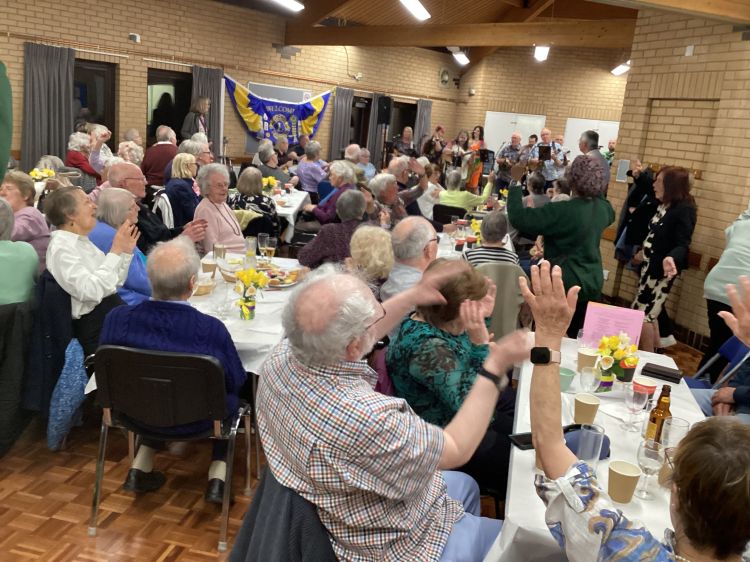 singing and dancing along with the band