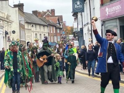 the parade led by the town crier